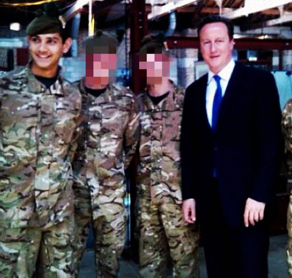  Dhillon, seen here with ex-Prime Minster David Cameron, served with the Royal Regiment of Scotland