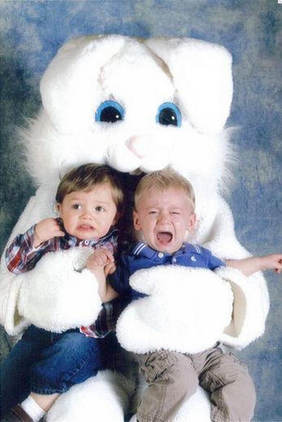 This adorable pair struggled to keep their composure as they were embraced by the fluffy white rabbit