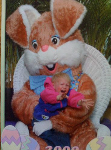 This little boy was grabbing out for his mum when he was placed into the arms of this sinister-looking bunny