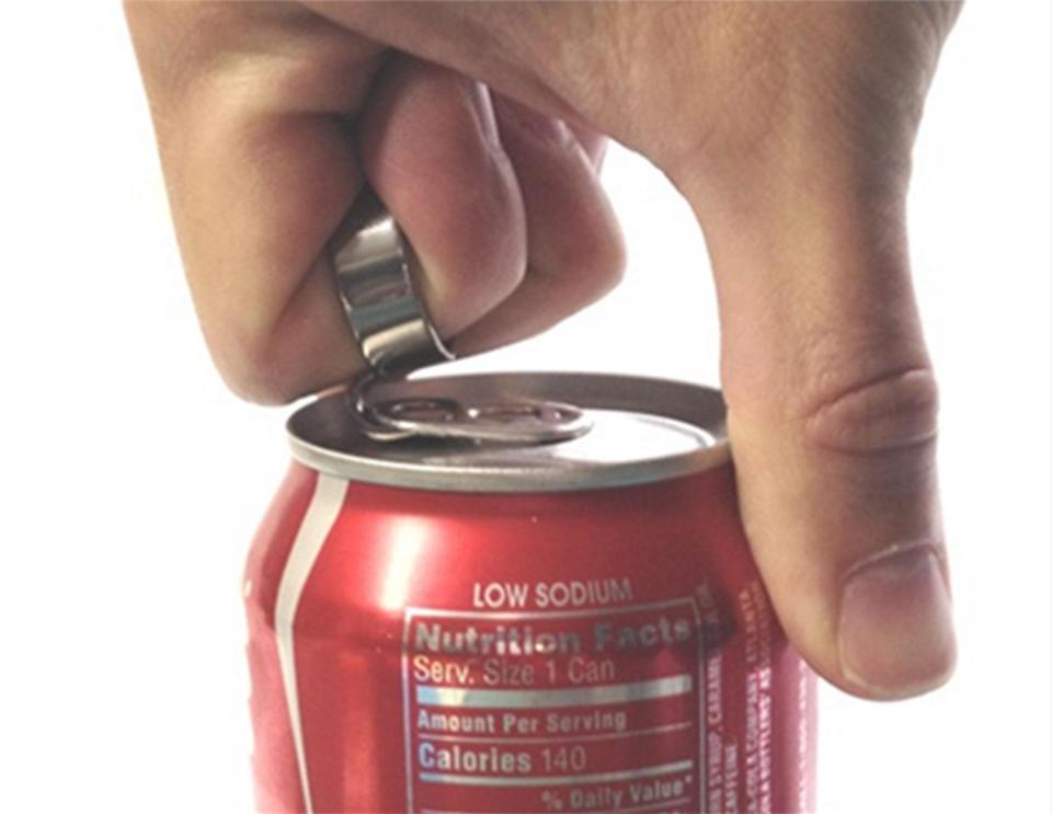  The Top Popper allows you to easily open cans of soda without broken nails