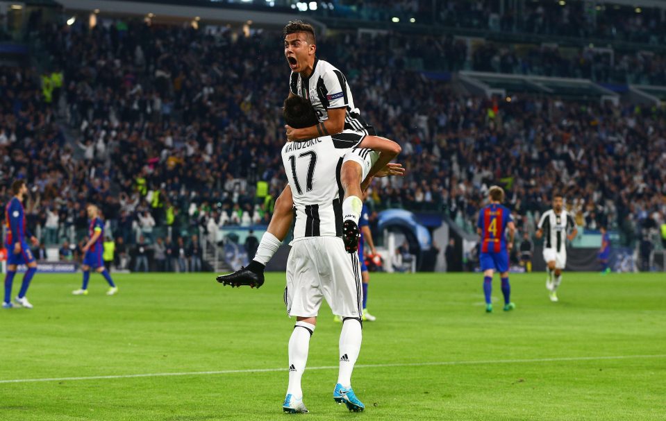  Paulo Dybala celebrates his second goal of the night against Barcelona