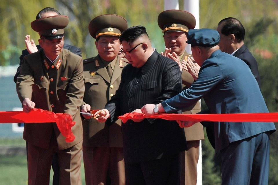  The tubby tyrant cut the ribbon to officially open the flats