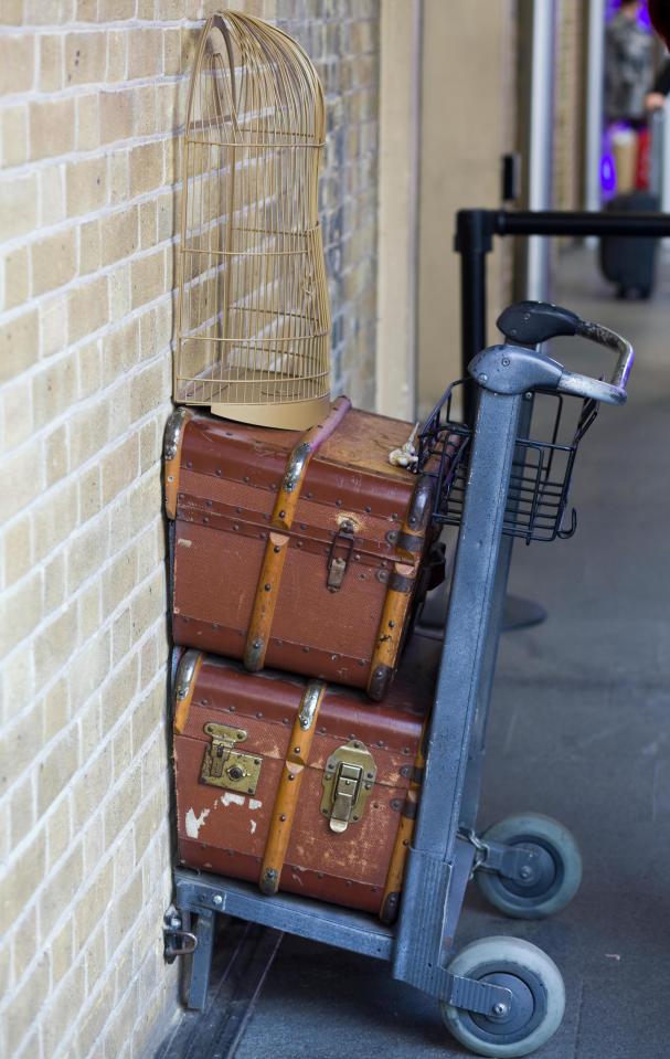  The luggage trolley embedded in the wall at Kings Cross station is a popular sight with Harry Potter fans