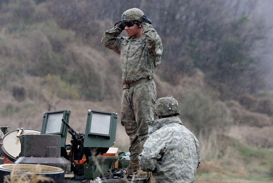  Tank operatives look over their machine during the drills