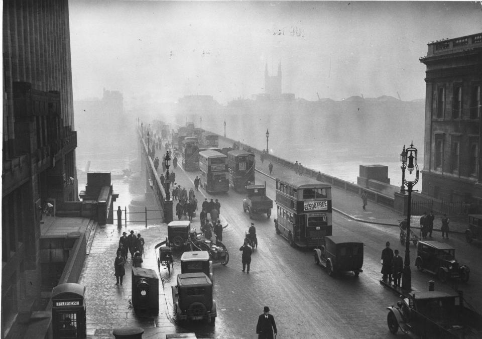  Early morning rush hour traffic crossing London Bridge in 1933