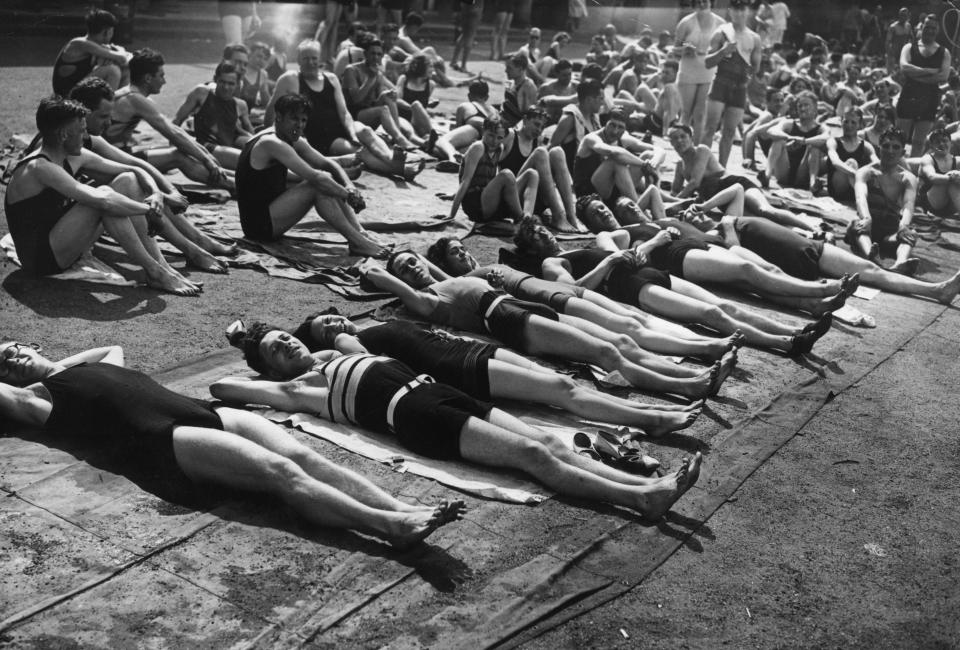  Londoners in bathing suits taking advantage of a heat wave at Hyde Park lido in 1933