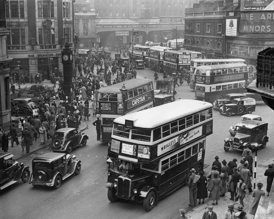  Emergency buses leaving Victoria station, London, following an underground train crash on the District Line in May 1938