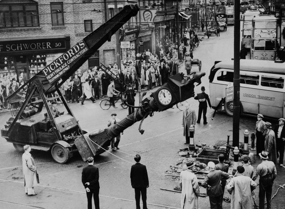  The Queen Victoria Jubilee Clock being removed for traffic improvement in London on August 1938