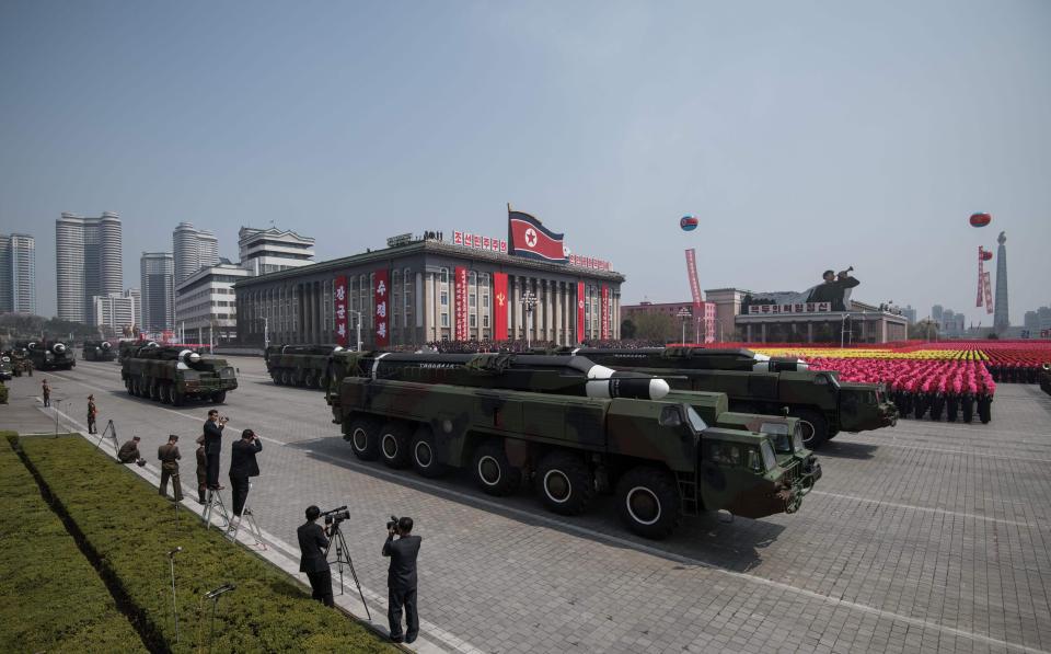  North Korea's military arsenal was paraded through Pyongyang in a military show of strength