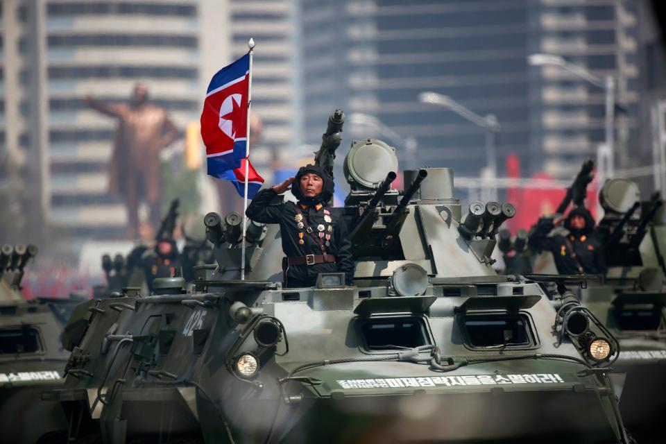  Tanks rolled down Pyongyang's main square named after Kim Il-Sung