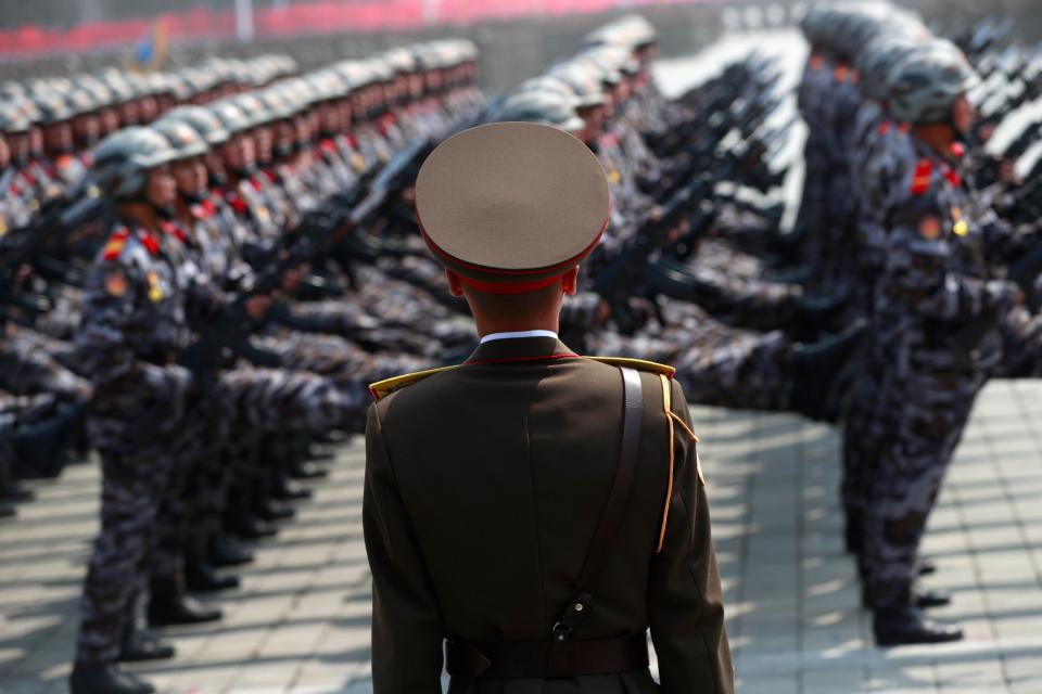  North Korean soldiers march during a parade for the 'Day of the Sun' festival