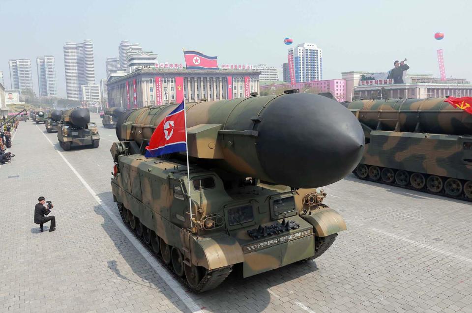  An enormous ballistic missile is transported through Pyongyang during the show of strenght