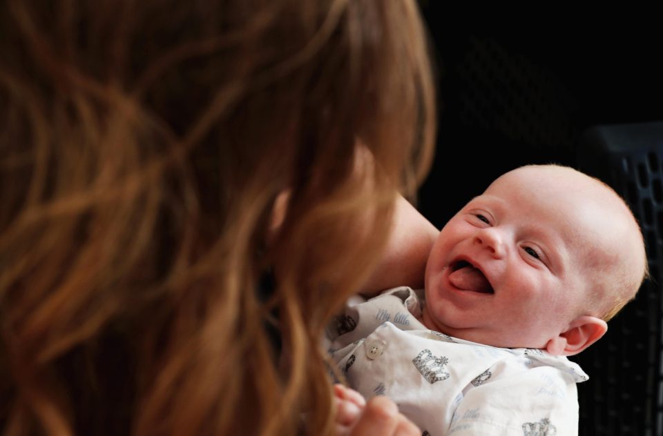  Geri shares a candid moment with her baby son