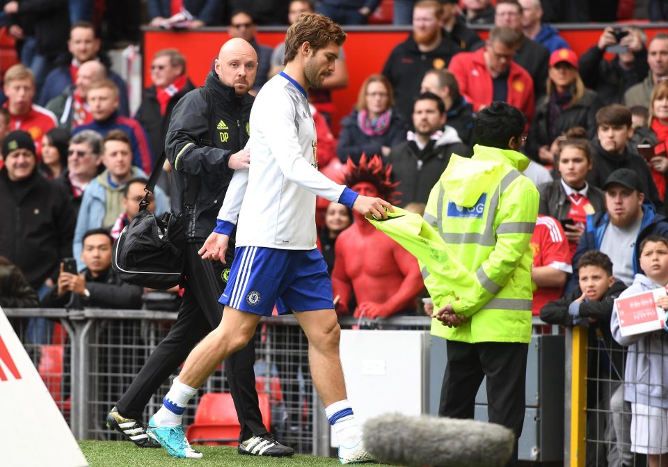  Marcos Alonso limped off during the warm-up at Old Trafford