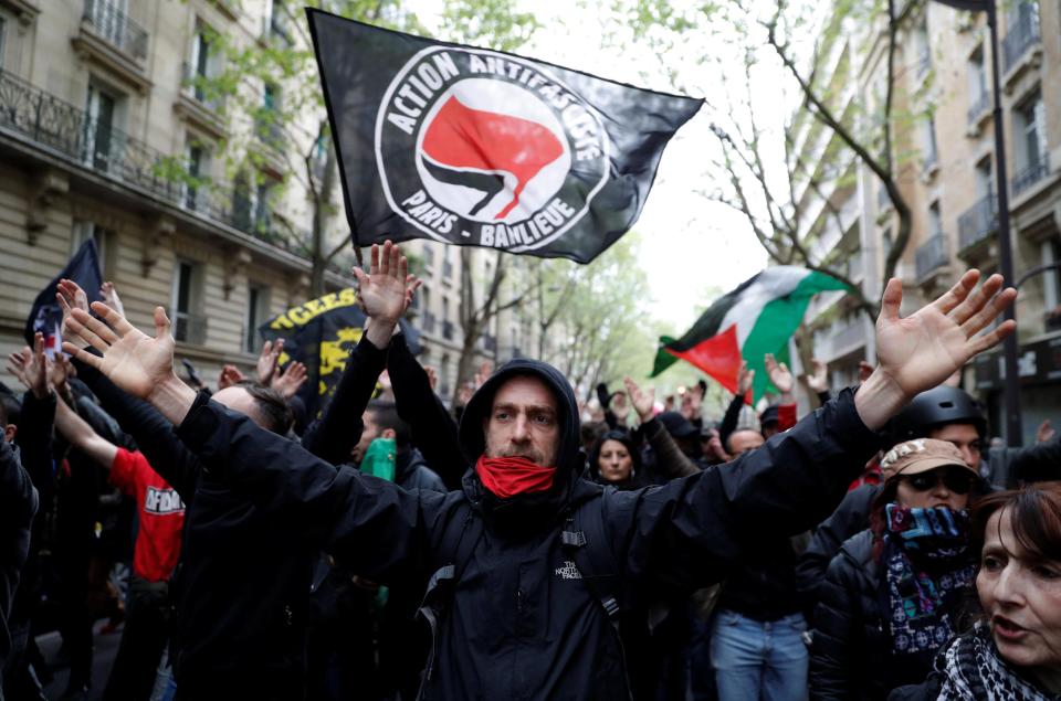  Demonstrators waved the banners of anti-fascist groups and chanted