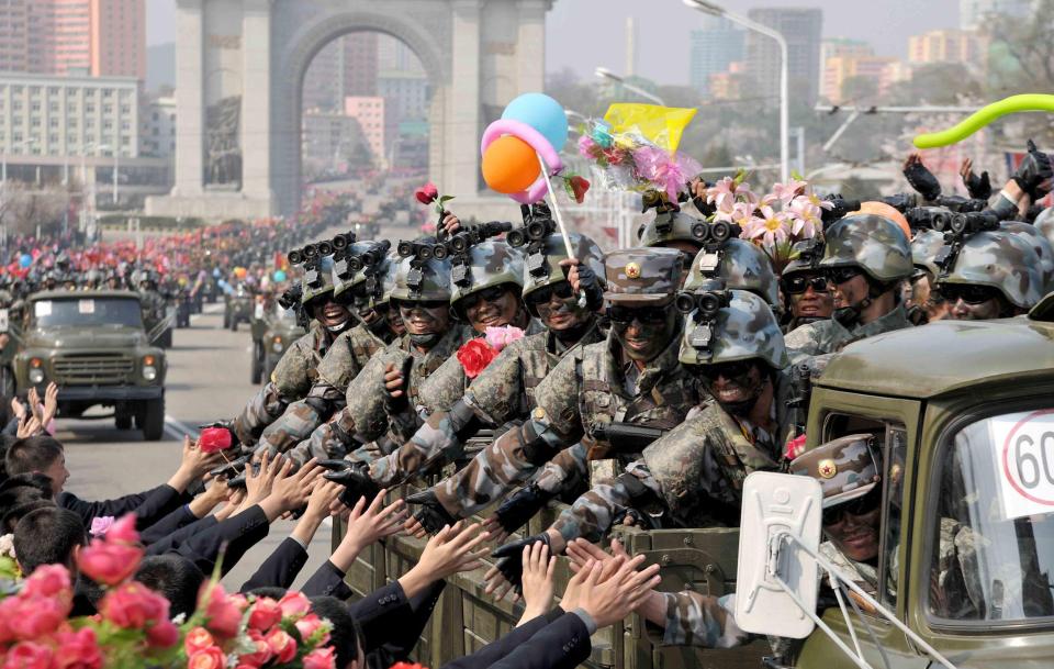  Special Forces troops are greeted by residents after the military parade in Pyongyang