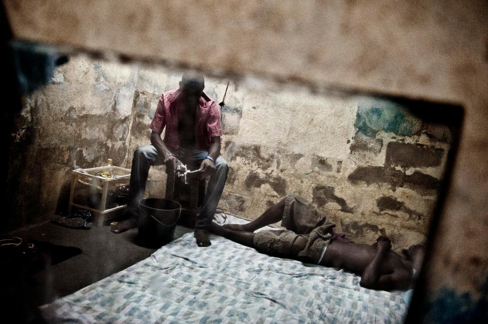  Waff, northest ghetto in Citè Soleil, december 2011, Port-au-Prince.Members of local gang. Raymond 23 years, brother of Emmanuel Wilmen the last boss of his gang, dead during the earthquake