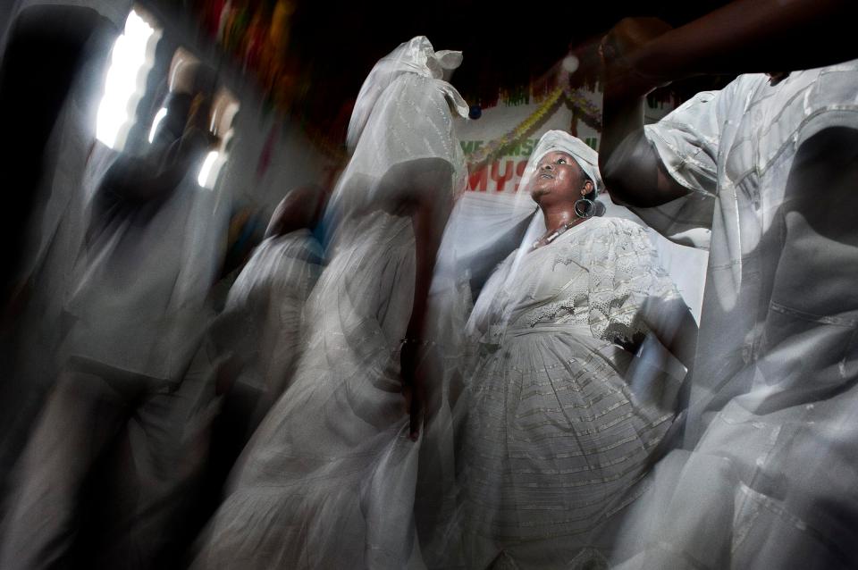  A collective ceremony inside a Voodoo family, the most important of the district "Soleil Quatorze"