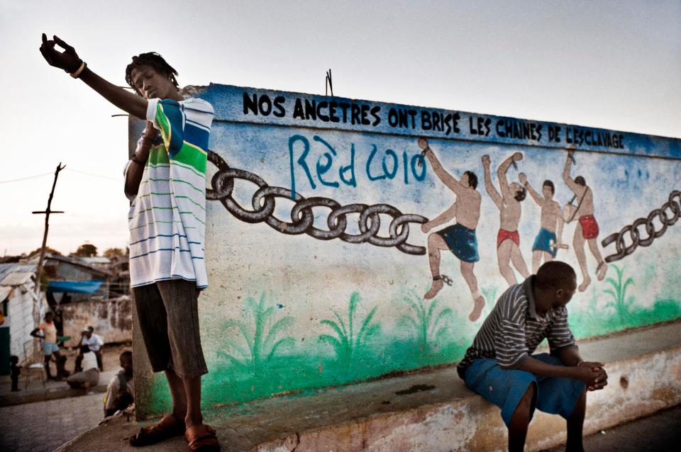  Port-au-Prince.Guys are spending time on the streets in Ti Haiti, one of the most dangerous district in Citè Soleil