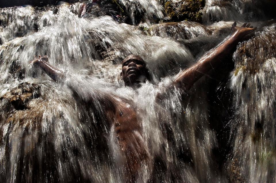  The greatest Haitian voodoo festival, attracts thousands of faithful every year. Cedric, 36 years old and lives in Port-au-Prince