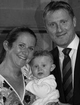  Rhian Burke pictured with her one-year-old son George and husband Paul who died just five days apart