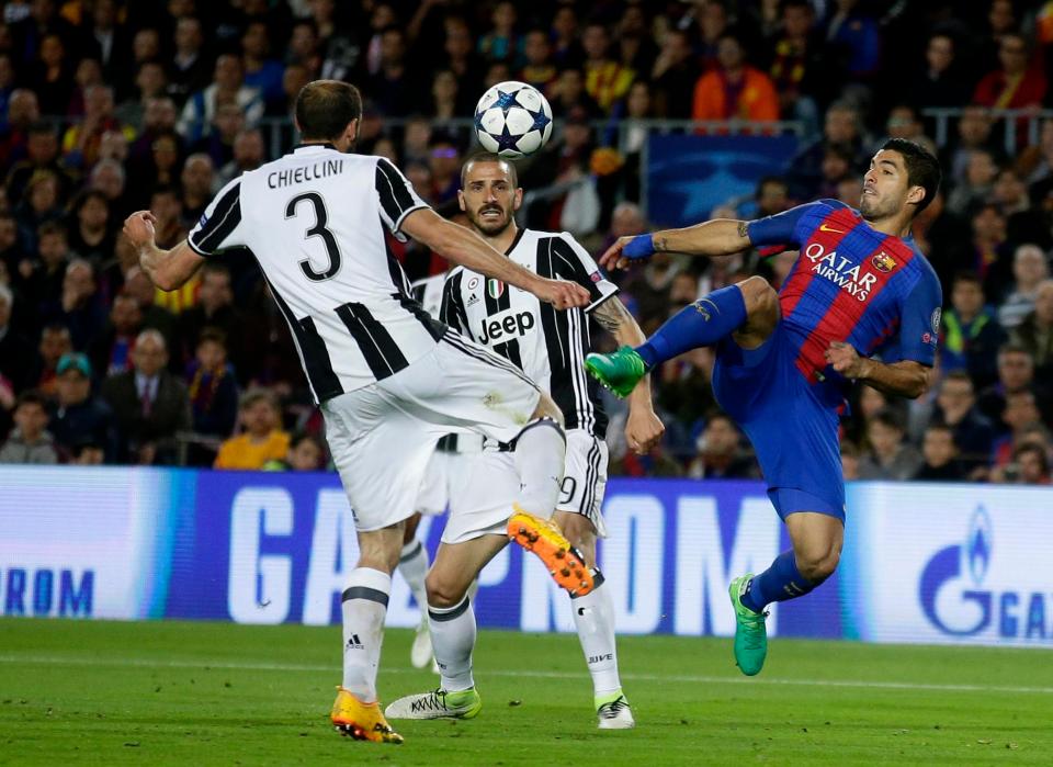  Leonardo Bonucci and Giorgio Chiellini in action against Barcelona on Wednesday evening