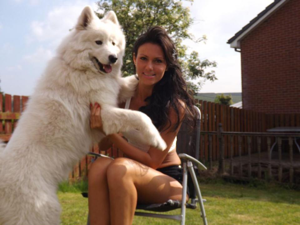  Louise Thompson with her five-year-old Saymoyed Dash, who went for a routine wash and trim at the dog parlour but came home looking rather different