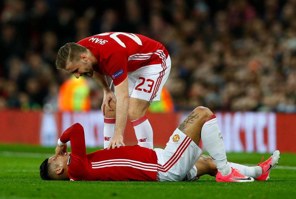  Marcos Rojo was on the floor in agony after appearing to twist his knee