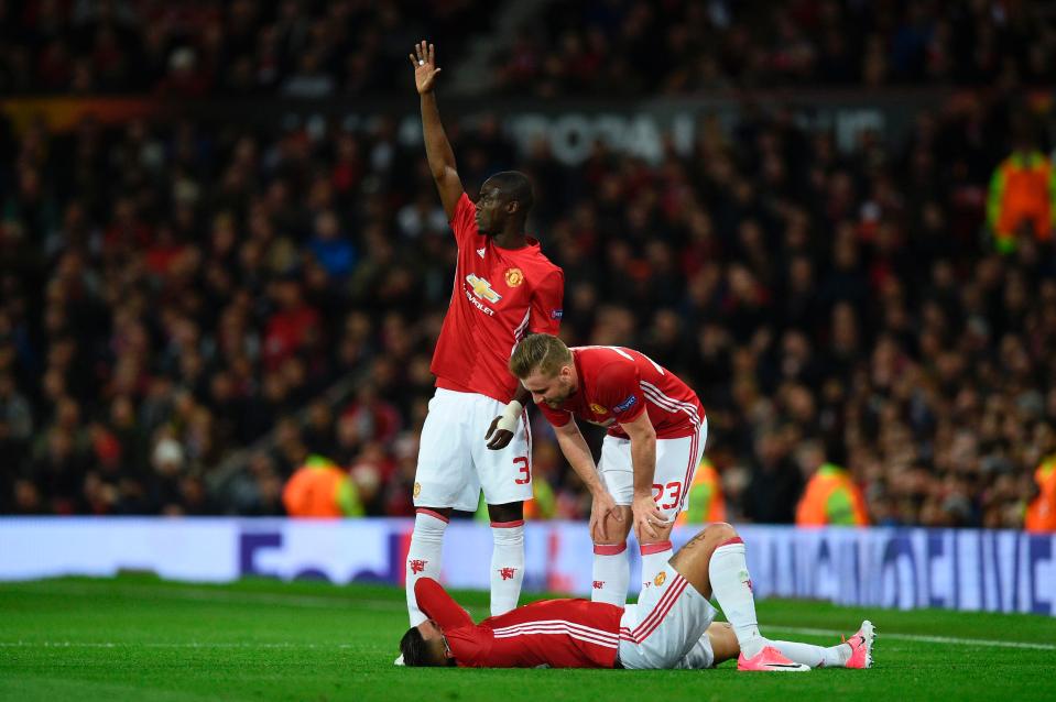  Manchester United's players called for the stretcher after seeing Marcos Rojo in pain