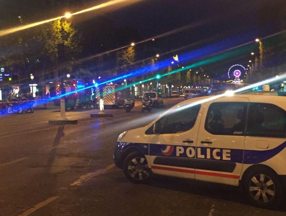  As police car at the scene in Paris, where a police officer has reportedly been killed