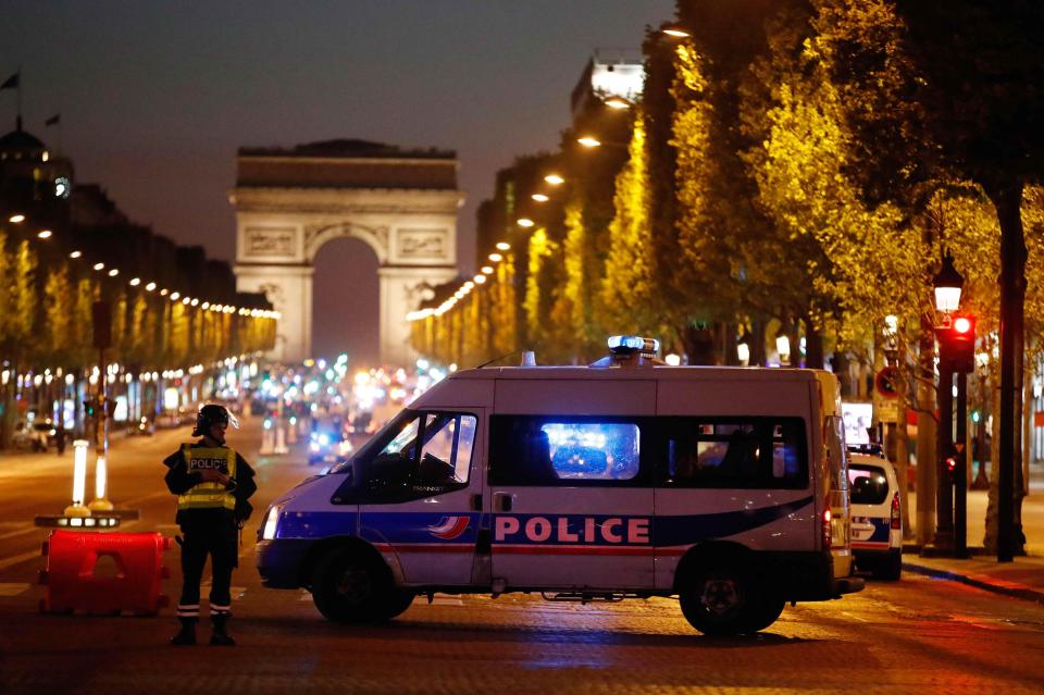  A police van at the scene in Paris, where a policeman has been shot