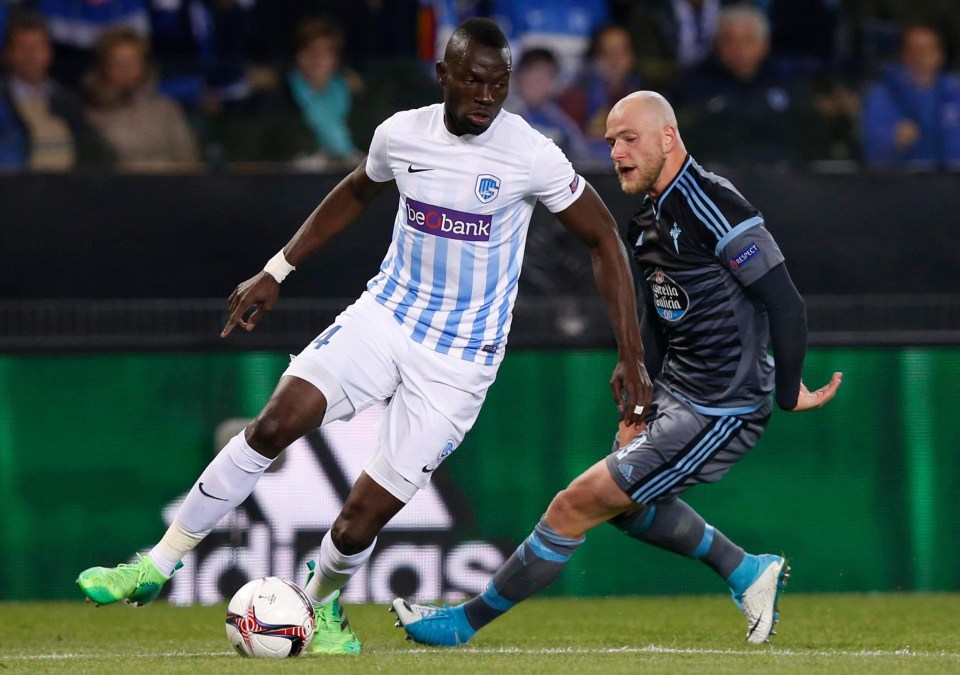 Genk star Omar Colley fends off experienced Swedish striker John Guidetti