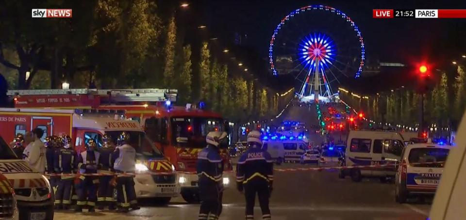  Emergency services at the scene of a fatal shooting in Paris