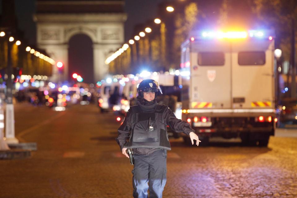  A police officer close to the Arc De Triomphe in Paris