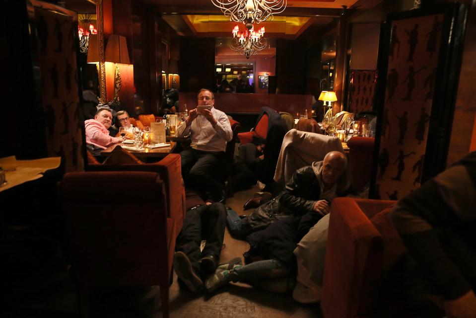  Diners cowered in a restaurant as shots rang out on the Champs-Elysees