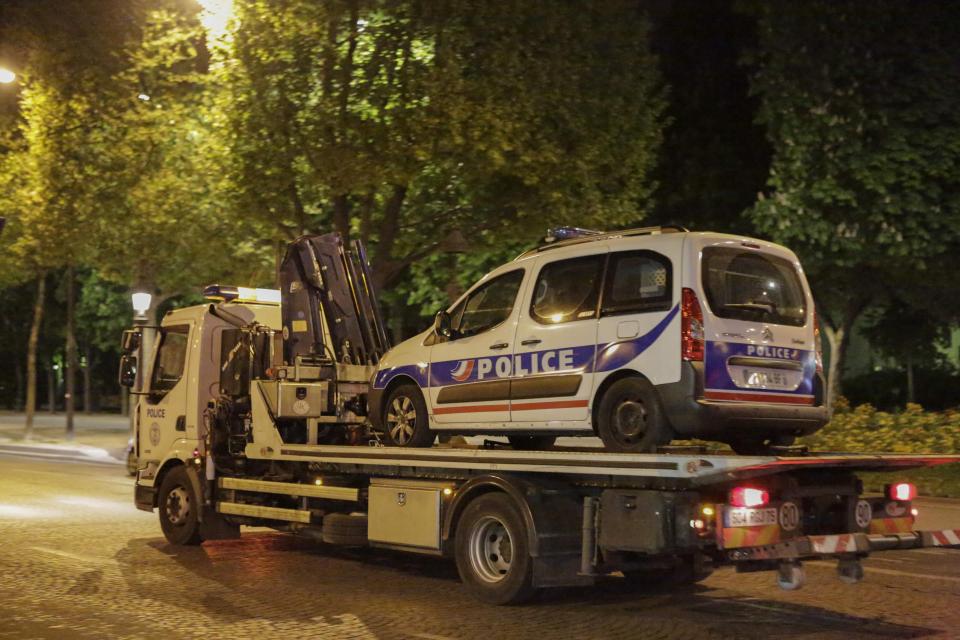  The bullet-ridden police car was taken away for investigation last night