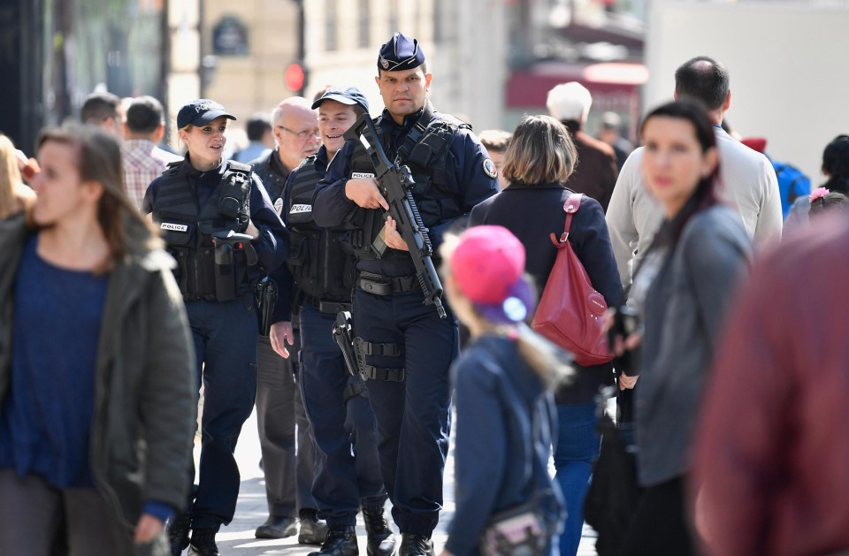 While heavily armed cops are deployed on the streets, French laws says they can’t guard polling stations with assault rifles