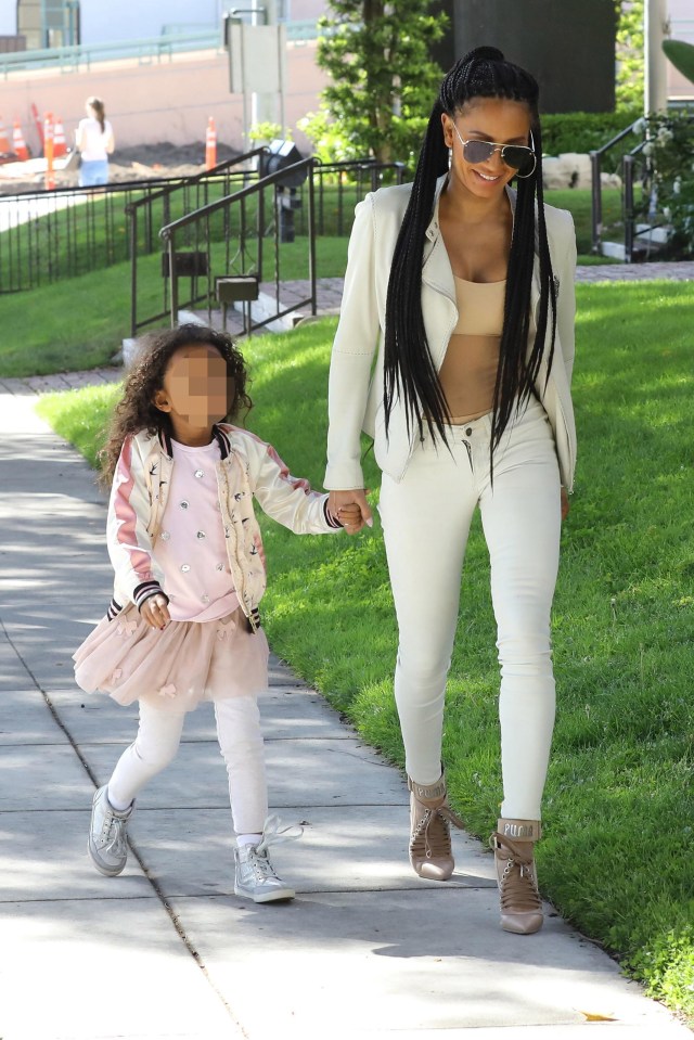 She held her daughter Madison’s hand as they headed to school