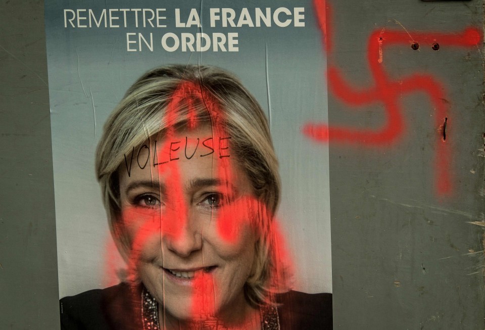 Many of Le Pen’s campaign posters have been defaced with Swastikas in outrage over her far right views