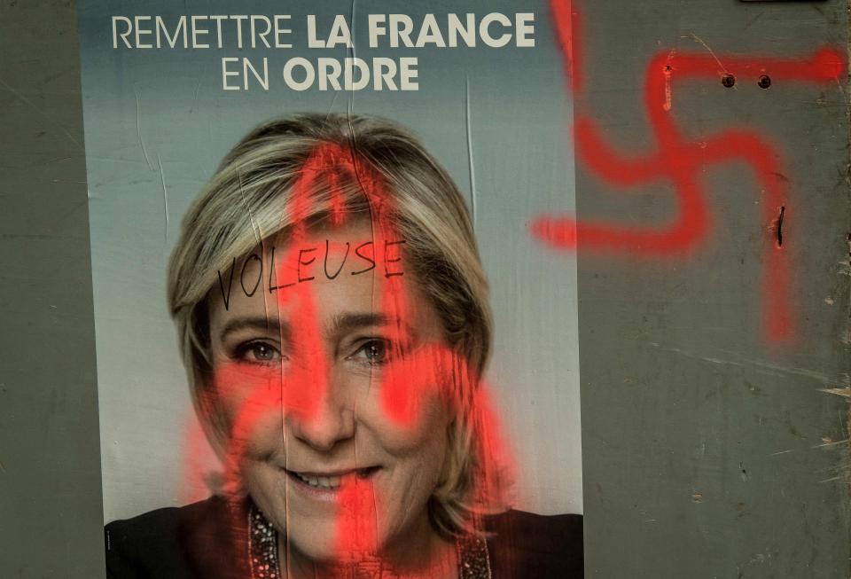  Many of Le Pen's campaign posters have been defaced with Swastikas in outrage over her far right views