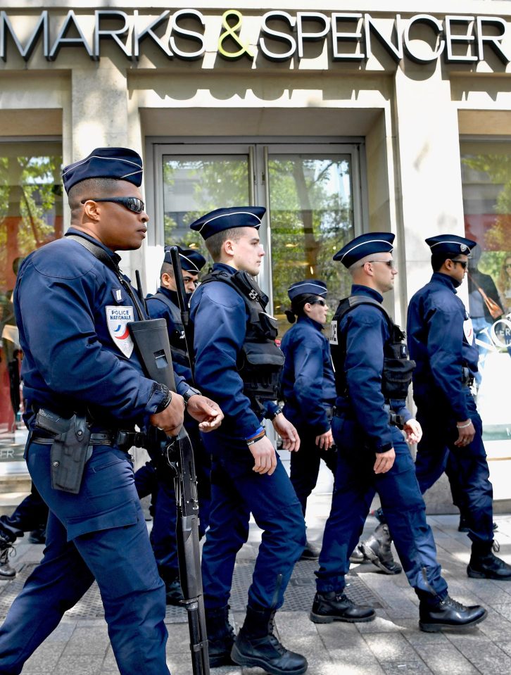  Heavily-armed police were on the streets of Paris this afternoon