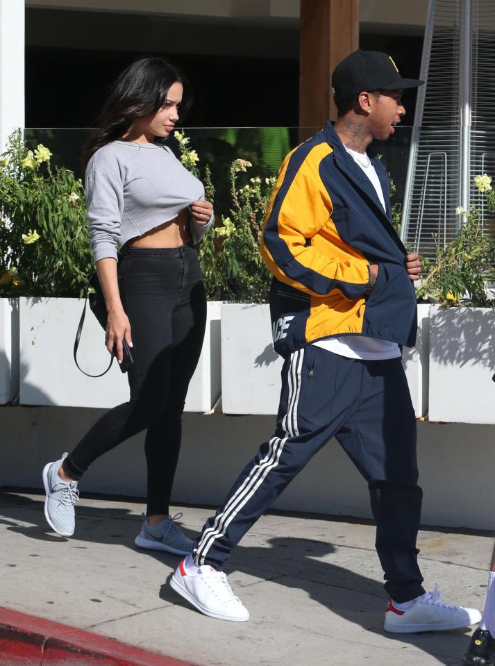  Tyga led the stunner past cameras on their recent outing