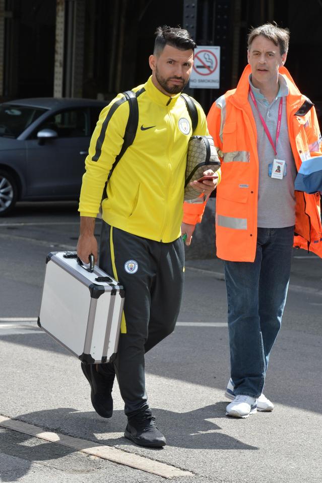  Leading striker Sergio Aguero held a metal briefcase as he travelled