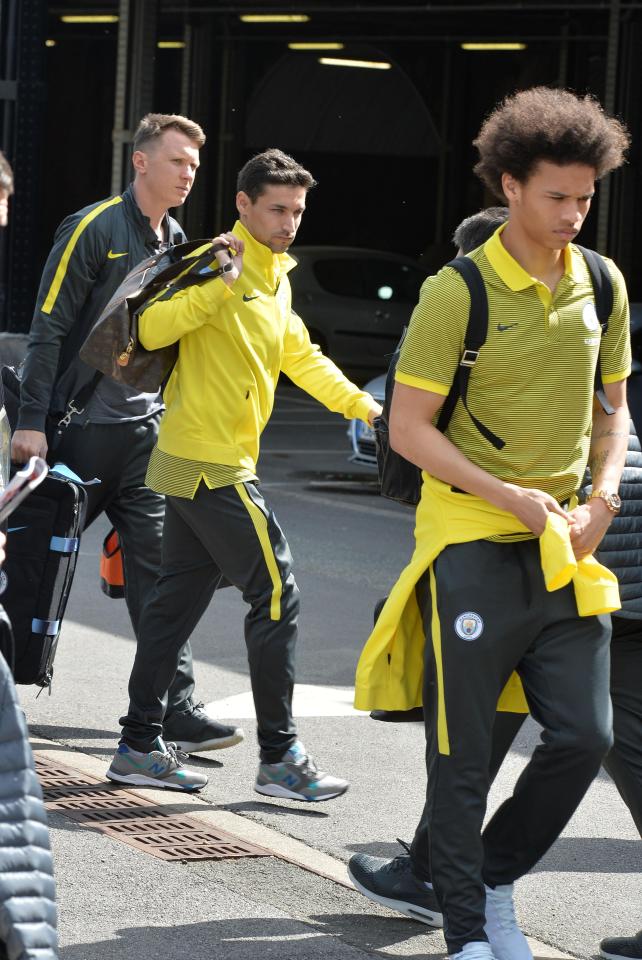  Leroy Sane wore a flashy gold watch with his jumper tied around his waist