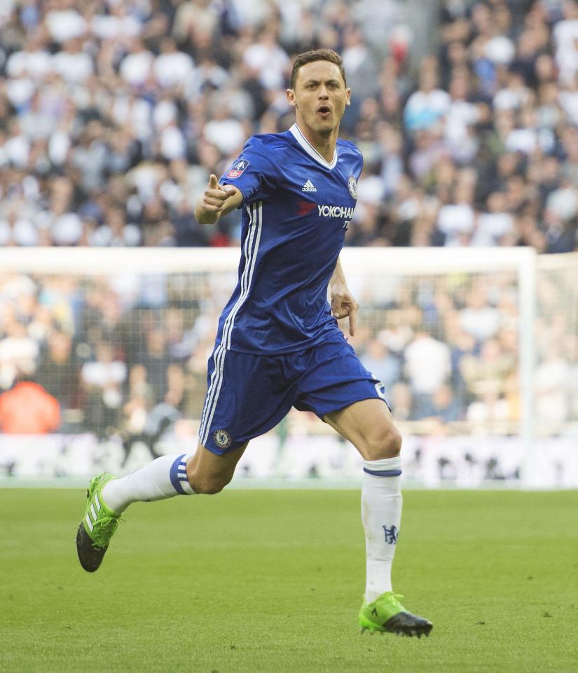  The midfielder celebrates his wonder strike that sealed a memorable win in the London derby