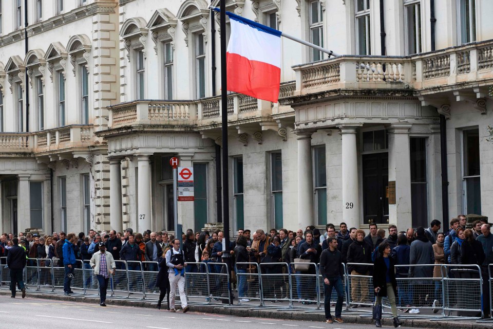 Hundreds of French nationals queue up outside the Lycee Francais Charles de Gaulle school in London to cast their votes