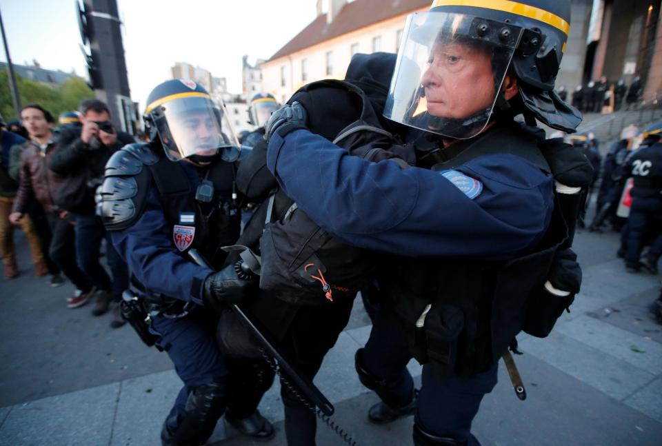  Demonstrators and police scuffled this evening in the French capital