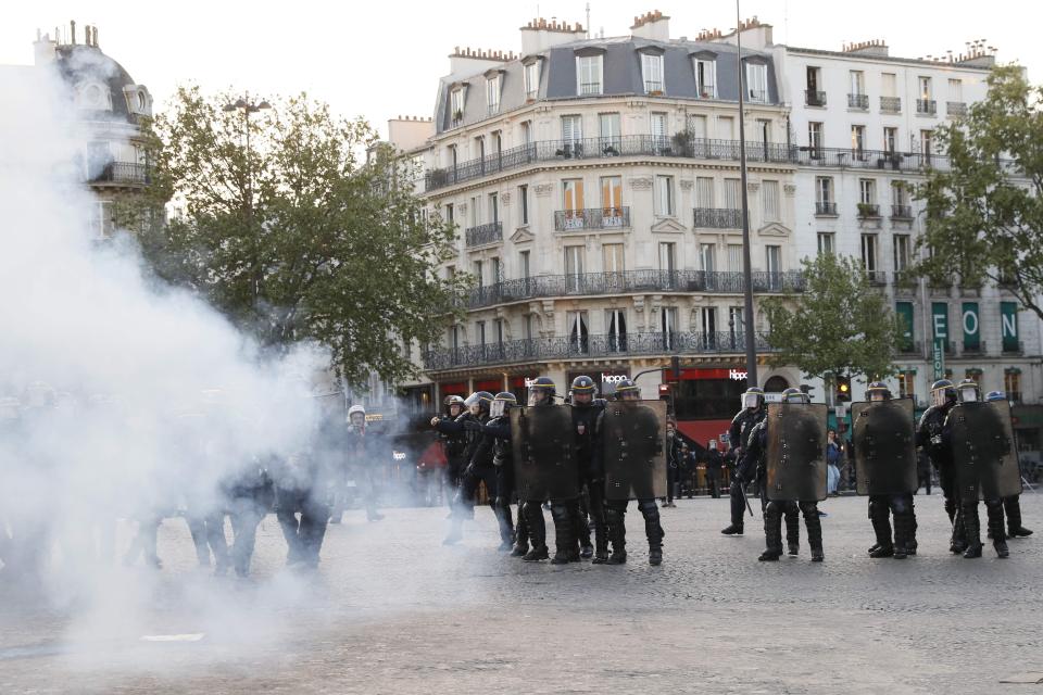  Groups of angry young people went up against police carrying shields and wearing helmets after earlier unrest ahead of the crunch election