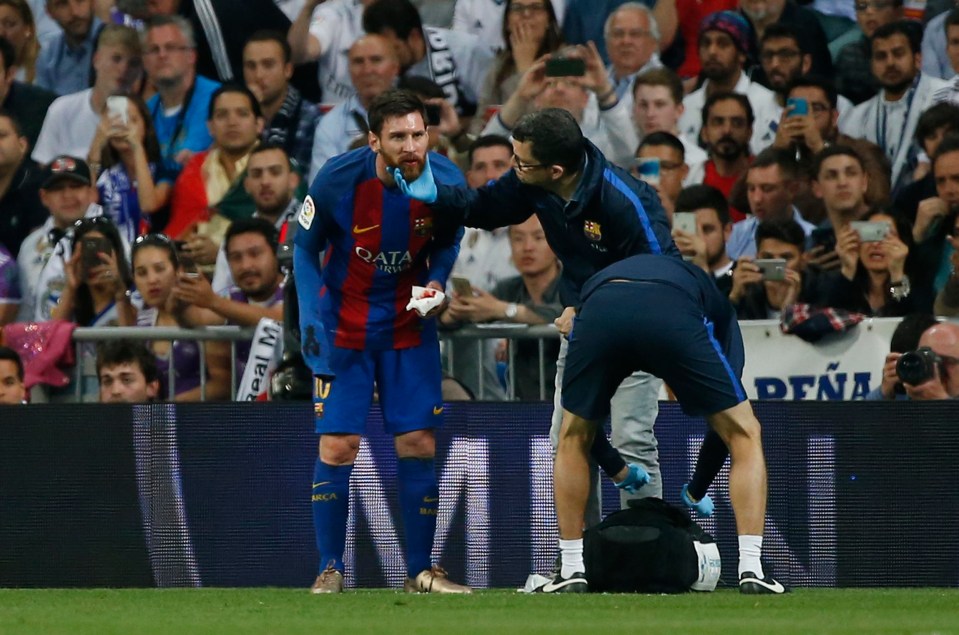 The Argentine star receives treatment on the pitch