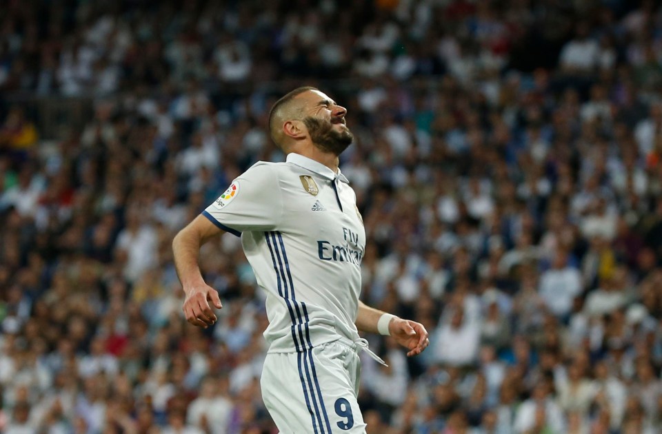 Karim Benzema reacts after missing an early chance